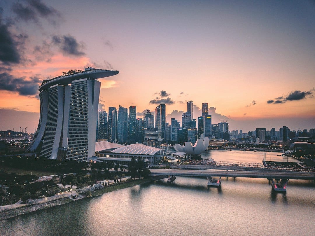 Modern Singapore luxury residential condominium tower at golden hour