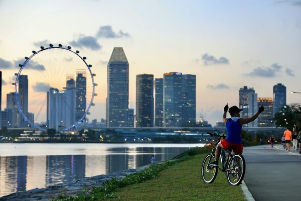 Singapore skyline at dusk along the waterfront